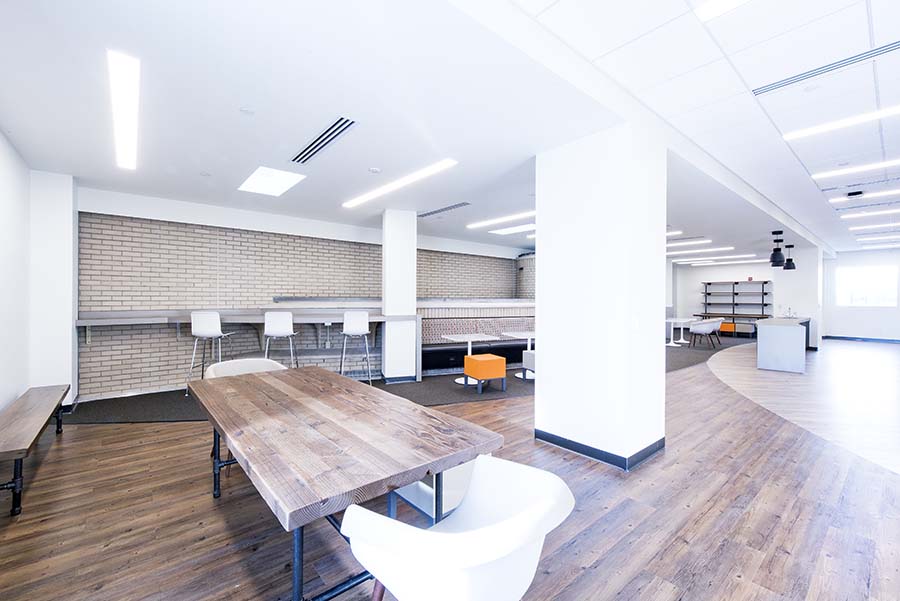 Photo of the Graduate Student Lounge featuring an open floor plan